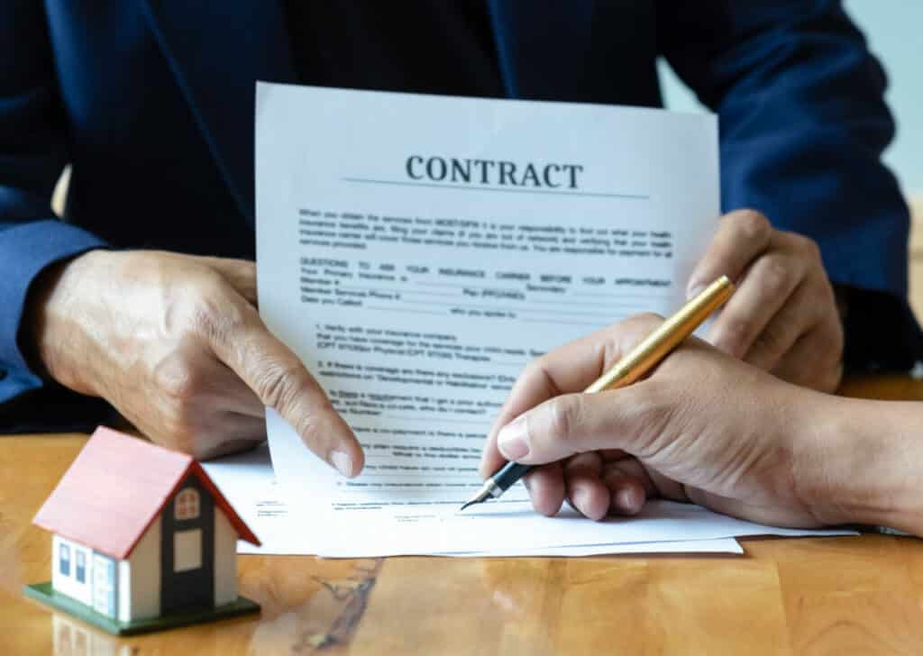 Signing a home purchase contract