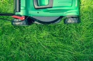 Lawn mower mowing a lawn