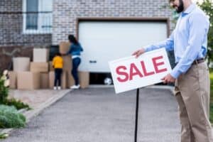 young realtor listing a home