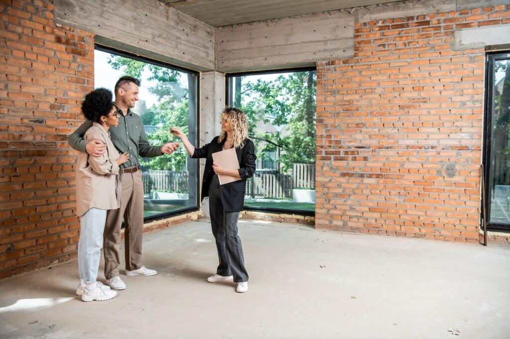 Husband and wife meeting with a real estate agent